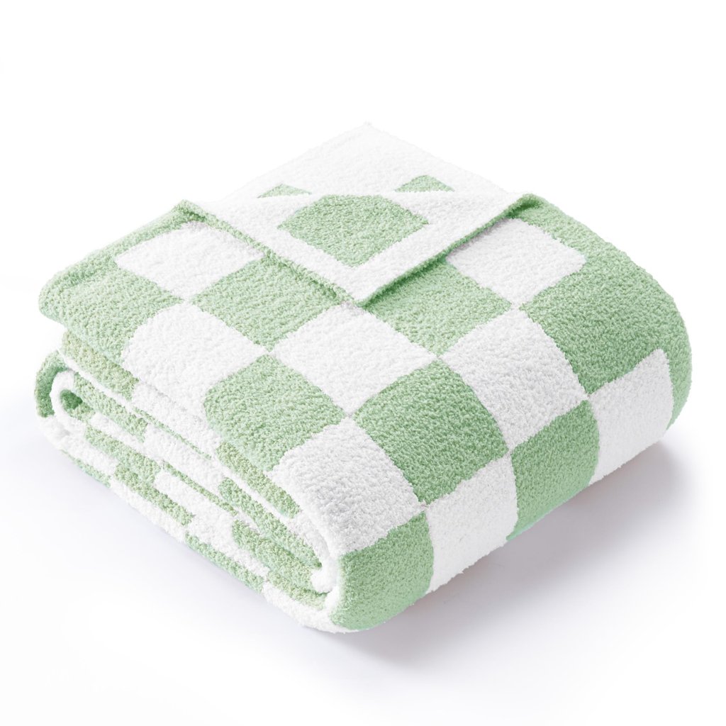 Manta polar reversible 130×150 cm, ligera, transpirable y con diseño de cuadros