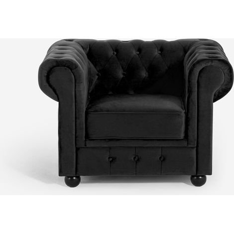 Sillón Chesterfield de terciopelo negro, estilo clásico