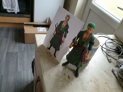Figura Zoro-One Piece+Lámina 21x15. MAS EN PERFIL