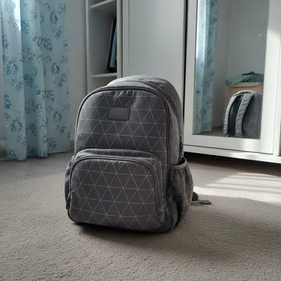 Mochila para carrito de bebé gris